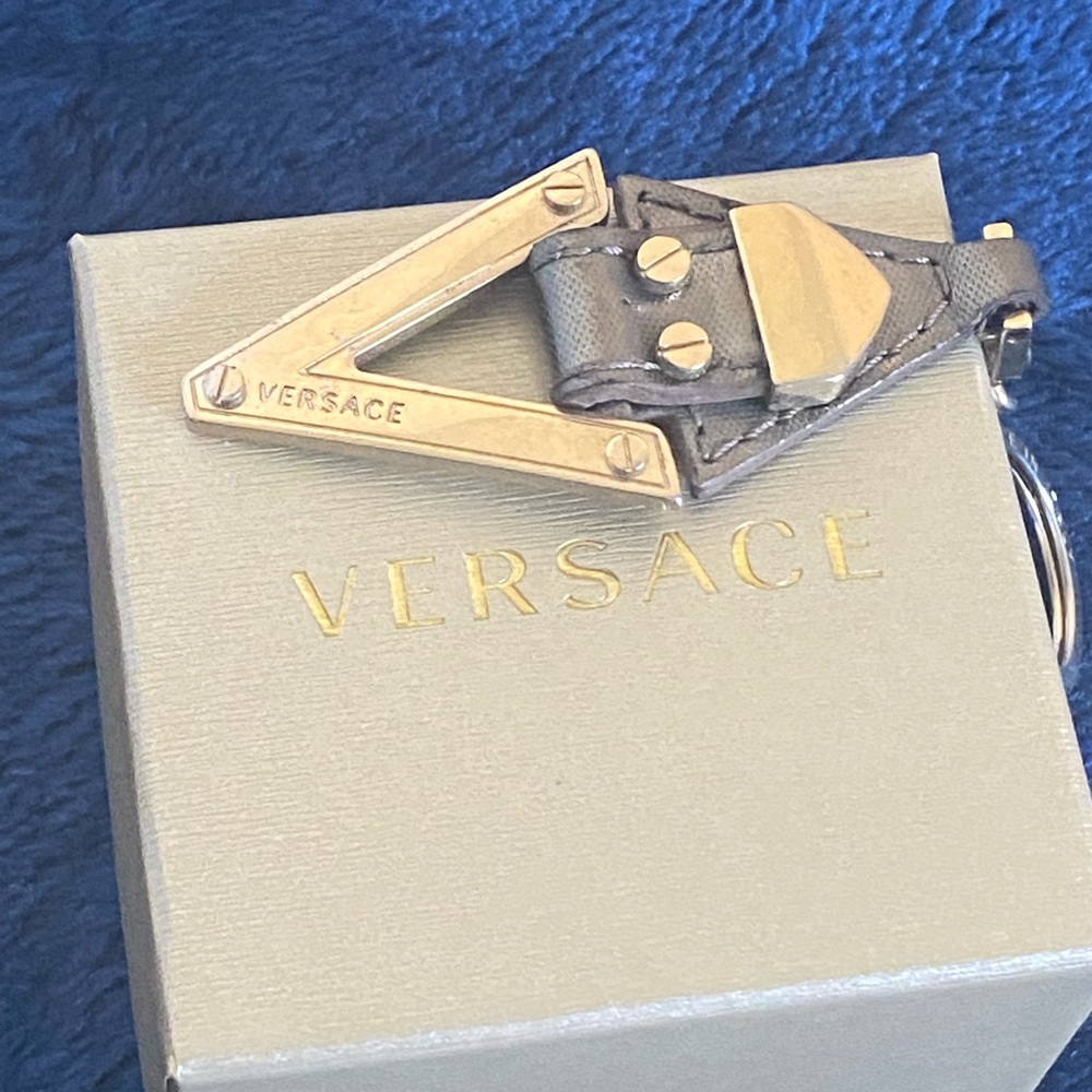 Versace Made in Italy key chain gold tone with leather V letter